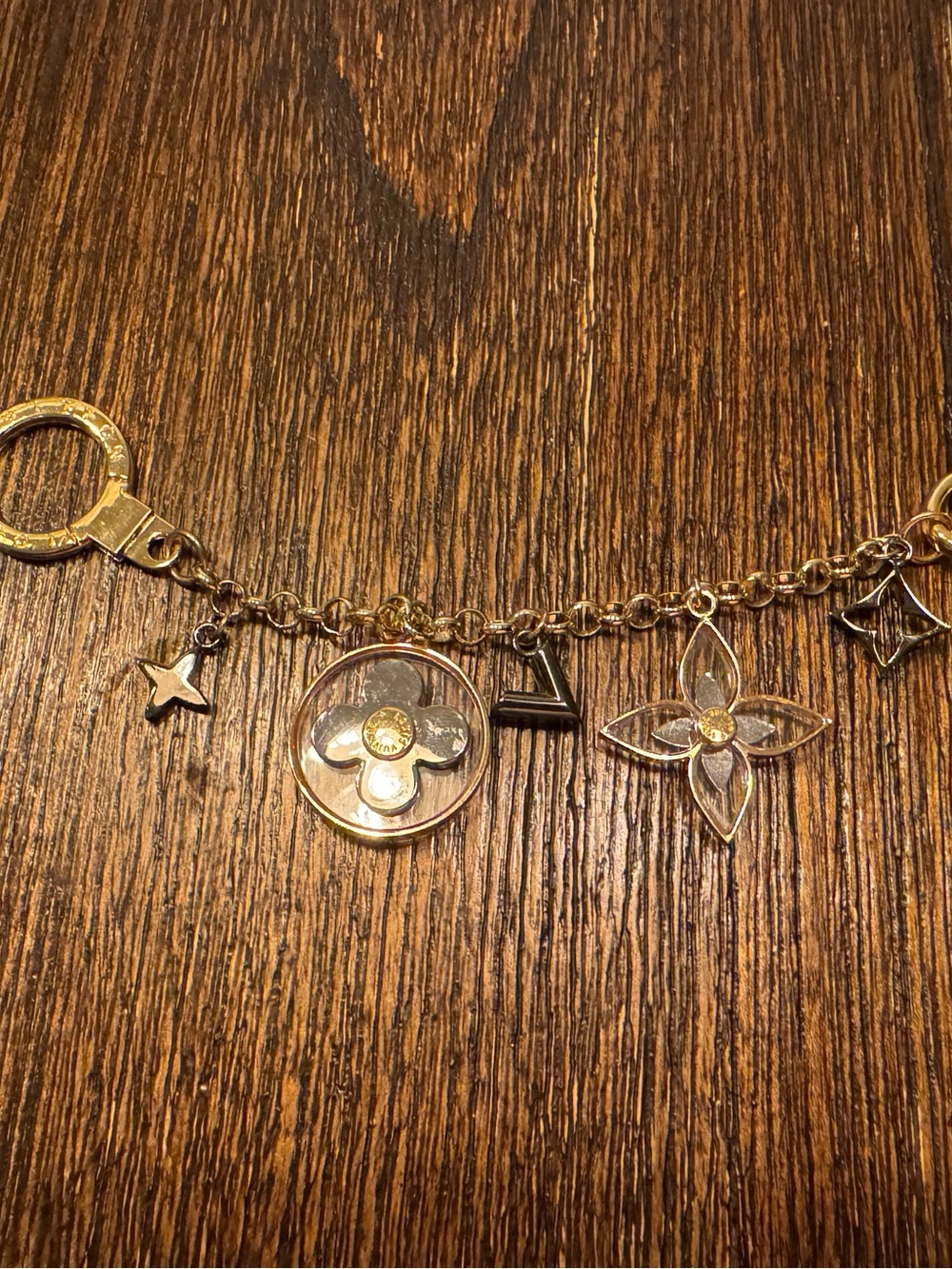 Gold-Tone Floral Charm Bracelet with Pendant Accents